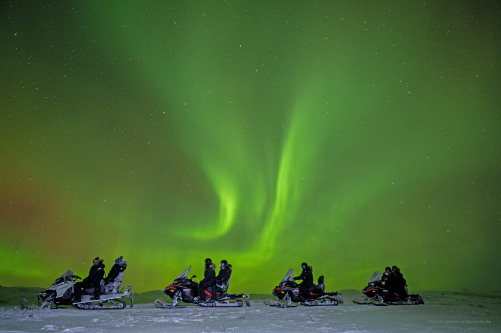Outback Abisko - Electric Snowmobile Aurora Tour Abisko Sweden by Arina Kraaijeveld